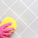 What do professionals use to clean grout?